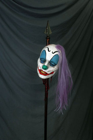 Clown Head Luttra on a Spike