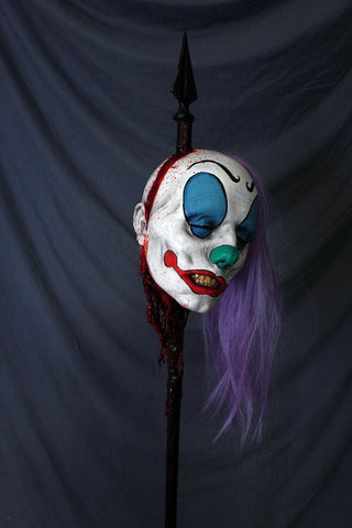 Clown Head Luttra on a Spike