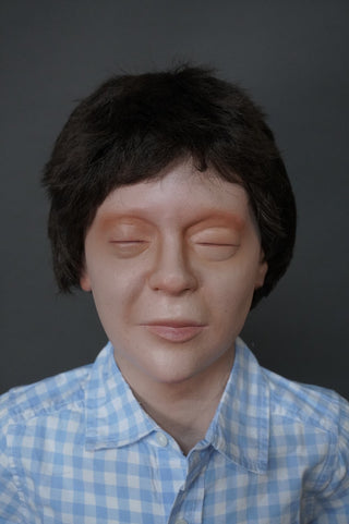 Closed Eye Boy Child Figure