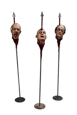 Three Assorted Heads on Spikes