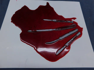 Blood Pool with Replica Scalpels