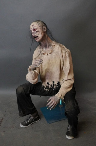 Crouching Carmen Zombie Figure